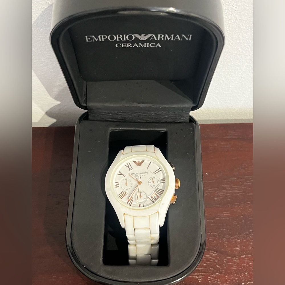 Emporio Armani Black Gloss Ceramic Watch.
Battery needs to be changed.
